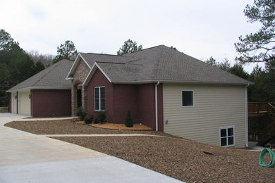 Example of a classic exterior home design in Other