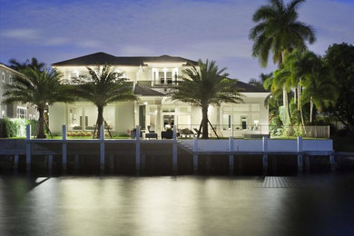 This is an example of a large contemporary house exterior in Miami.