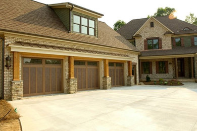 Mid-sized beige two-story mixed siding exterior home photo in Other