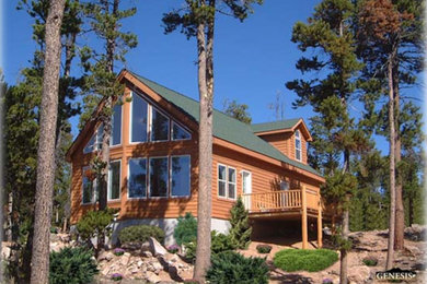 Large rustic brown two-story mixed siding exterior home idea in Denver with a clipped gable roof