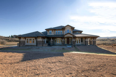 Example of an arts and crafts exterior home design in Denver