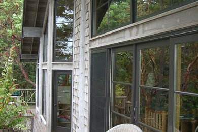 Example of a cottage exterior home design in Seattle