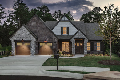 Mid-sized transitional gray one-story brick exterior home idea in Atlanta with a shingle roof