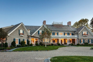 Huge coastal gray two-story wood gable roof idea in New York