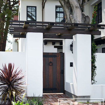 Customized Wood Garage Door & Gate Design in an Authentic Spanish Colonial Style