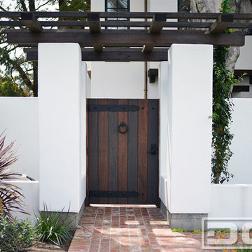 Customized Wood Garage Door & Gate Design in an Authentic Spanish Colonial Style