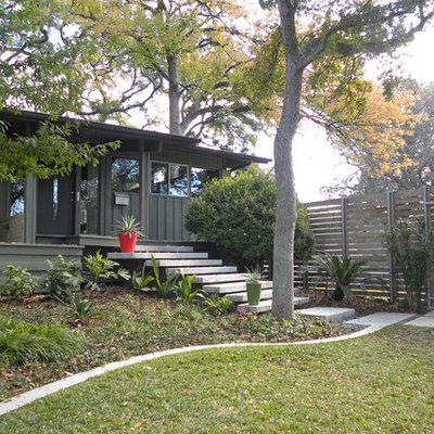 Inspiration for a 1950s one-story exterior home remodel in Dallas