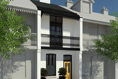 Ejemplo de fachada de casa blanca clásica de tamaño medio de dos plantas con tejado de metal