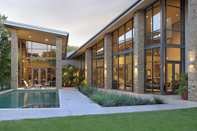 Design ideas for a modern house exterior in Dallas.