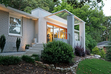 Inspiration for a contemporary gray mixed siding exterior home remodel in Atlanta