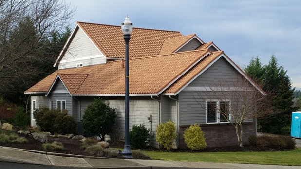 Mediterranean Exterior by CC&L Roofing Co