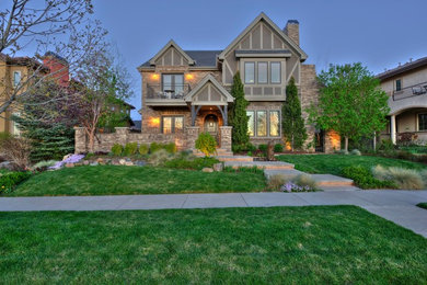 Inspiration for a large transitional two-story gable roof remodel in Denver