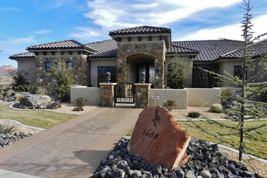 Huge mountain style beige stucco exterior home photo in Salt Lake City