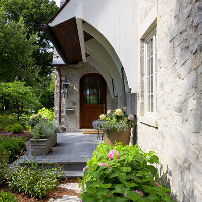 Inspiration for a timeless stone exterior home remodel in Chicago