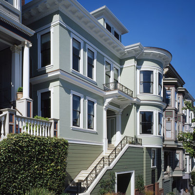 Ornate wood exterior home photo in San Francisco