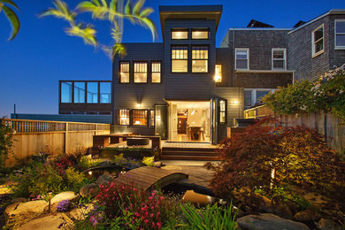 Transitional gray two-story vinyl exterior home idea in San Francisco