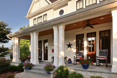 Inspiration for a farmhouse exterior home remodel in Chicago