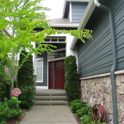 Arts and crafts green exterior home photo in Seattle