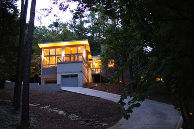 Gey contemporary house exterior in Raleigh with mixed cladding.