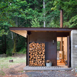 Diseño de fachada rústica, pequeña, de una planta, con tejado de un solo tendido