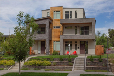 Dreistöckige Moderne Doppelhaushälfte mit Putzfassade und Flachdach in Denver