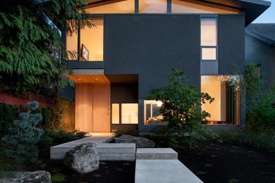Inspiration for a contemporary two-story gable roof remodel in Vancouver