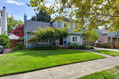 Mid-sized traditional blue two-story exterior home idea in Sacramento with a shingle roof