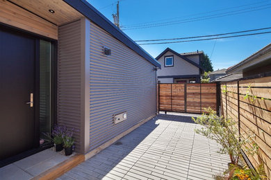 Example of an urban exterior home design in Vancouver