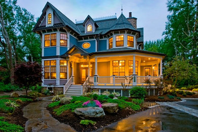 Inspiration for a large timeless two-story wood exterior home remodel in Philadelphia