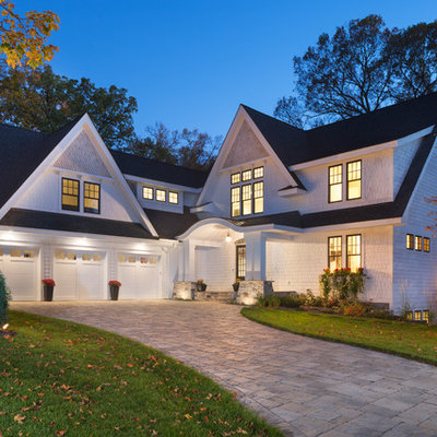 Huge transitional white three-story concrete fiberboard exterior home idea in Minneapolis with a shingle roof