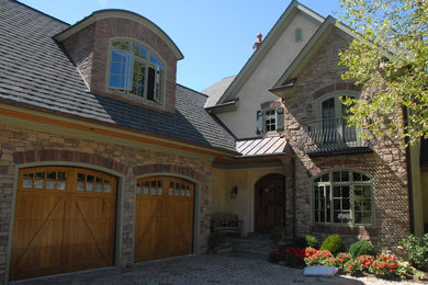 Inspiration for a large rustic brown two-story mixed siding exterior home remodel in Baltimore with a shingle roof