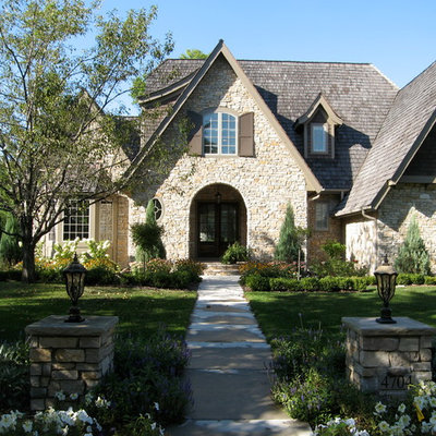 Elegant stone exterior home photo in Minneapolis