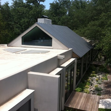 Elastomeric Flat Roof and Standing Seam Metal Roof in Paint Grip