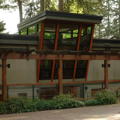 Inspiration for a large contemporary multicolored two-story wood exterior home remodel in Vancouver