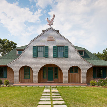 Electic & Whimsical Shingle Style House with Green Shutters & Eagle Weathervane