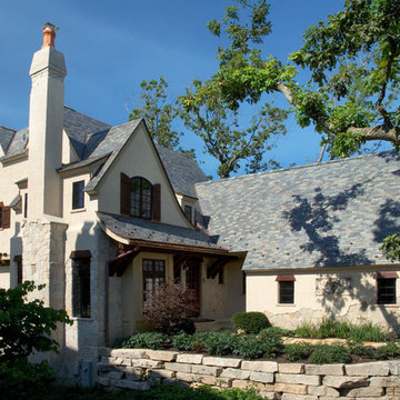 Elegant Stone and Stucco French Country House with Multi-Colored Slate Roof