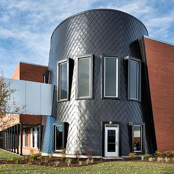 Elliptical building with Diamond metal tiles