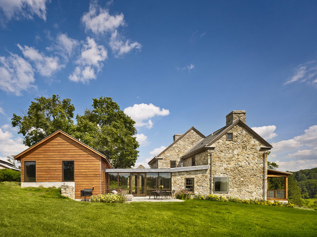 Farmhouse Exterior by neely architecture