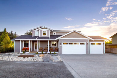 Transitional gray two-story concrete fiberboard exterior home photo in Other with a shingle roof