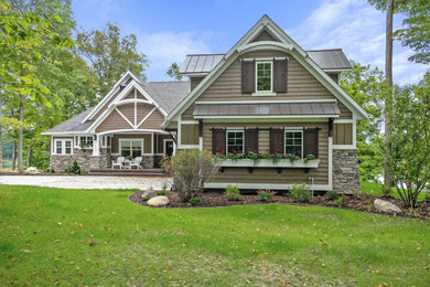 Example of a beach style exterior home design in Grand Rapids