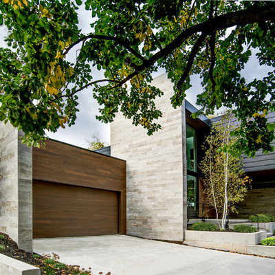 Large contemporary two-story mixed siding house exterior idea in Chicago