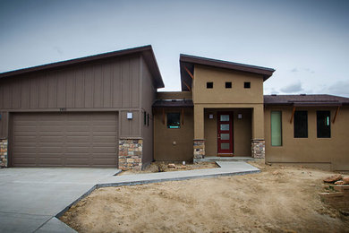 Example of a mid-sized trendy exterior home design in Denver