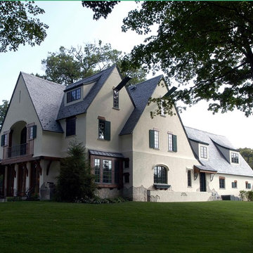 European Stone and Stucco Style Chateau with Rustic Timber Window Headers