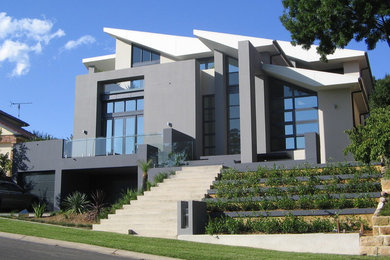 Modelo de fachada de casa gris contemporánea grande de dos plantas