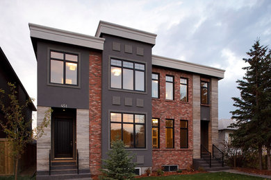 Design ideas for a modern house exterior in Calgary.
