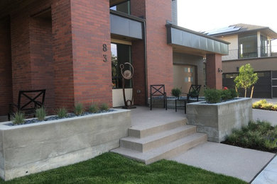 Diseño de fachada de casa moderna de dos plantas con revestimiento de ladrillo