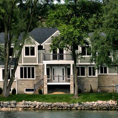 Elegant stone exterior home photo in Chicago