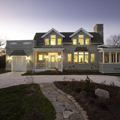Inspiration for a timeless wood exterior home remodel in Boston