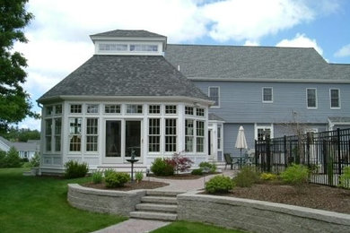 Large gray two-story exterior home idea in Boston