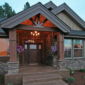 Exterior ebtry-way with wood beams and stone accents